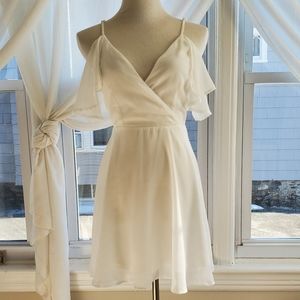 White flutter sleeve faux wrap dress